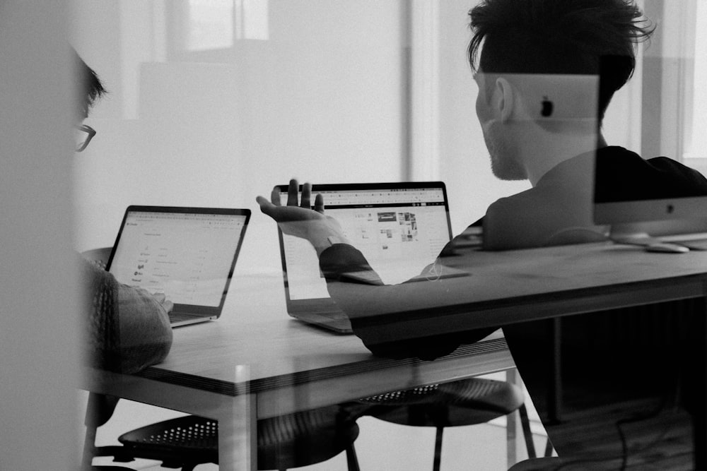 Professionals reviewing documents in a meeting